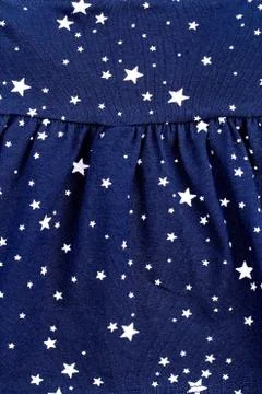Cute pattern in small white stars. Stock Photos