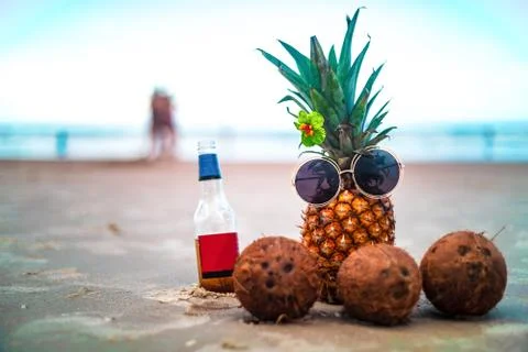 Cute Pineapple Hibiscus Flower with Coconuts On Sunny Beach Stock Photos