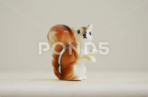 Cute porcelain squirrel side shot Stock Photos