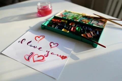 Cute postcard with declaration of love in calligraphic style res Stock Photos