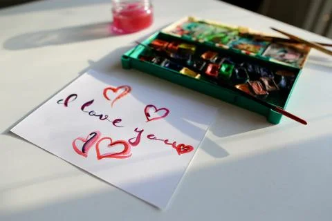 Cute postcard with declaration of love in calligraphic style res Stock Photos