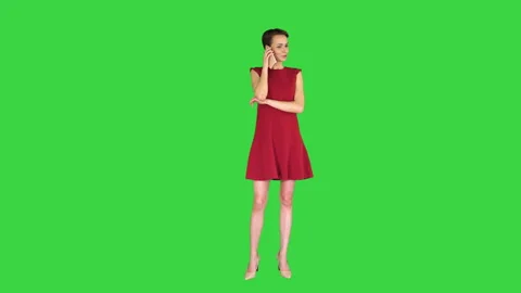 Cute pretty lady talking on mobile phone on a Green Screen, Chroma Key. 스톡 동영상 140534992