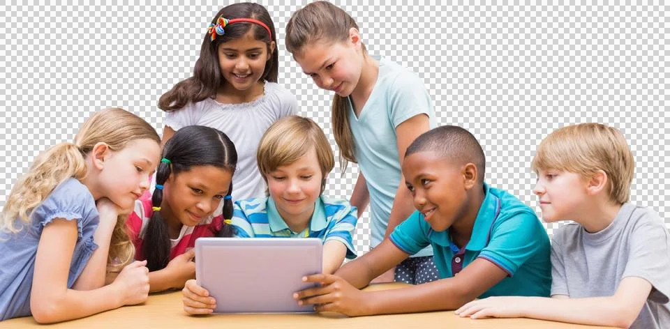 Cute pupils using tablet computer in library Stock Photos