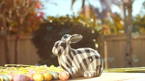 Cute Rabbit in Nest with Falling Blue Hearts and Bokeh 스톡 동영상 330245993