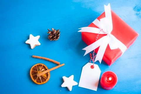 Cute red present on blue background Stock Photos