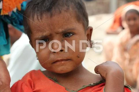 Cute Refugee Girl in Pakistan Stock Photos