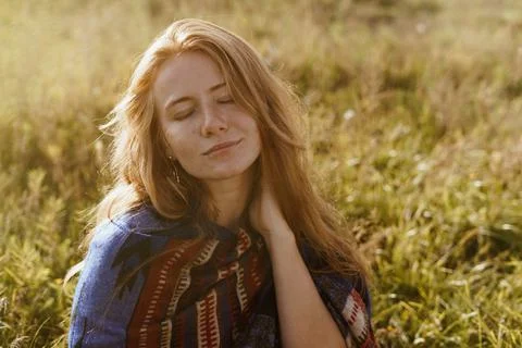 Cute relaxed expression of the face with closed from the naked eyes of the girl Stock Photos