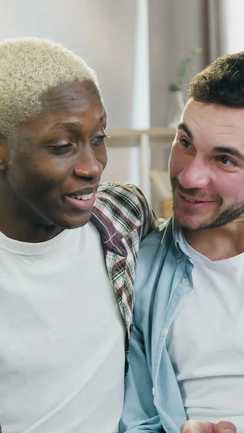Cute satisfied amorous 25-aged multiracial male couple of unconventional sexual  Stock Footage 330075005