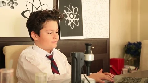 Cute school boy studying with laptop 스톡 동영상 72929873