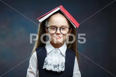 Cute Schoolgirl Shout Cover Head with Open Book Stock Photos