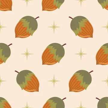 Cute seamless pattern with hazelnut and green stars on pastel beige backgro.. Stock Illustration