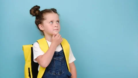 Cute small kid thinking looking at copy space having question, making choice Stock Footage 159640070