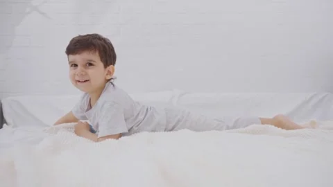 Cute smiling boy looking at camera. Stock Footage 246023768