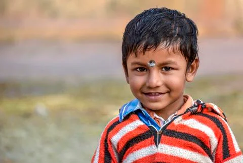 A cute smiling boy smiling and looking at the camera Fotos Stock