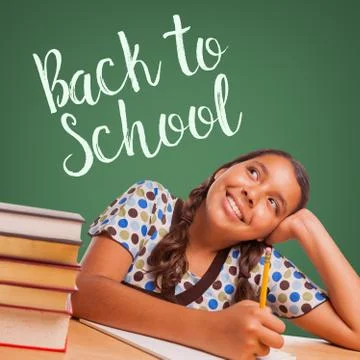 Cute Smiling Hispanic Girl Studying and Looking Up to Back To School Written  Stock Photos