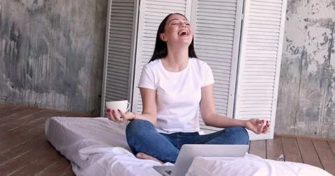 Cute smiling woman using digital tablet at home. Student girl reading or Stock Footage 130798006