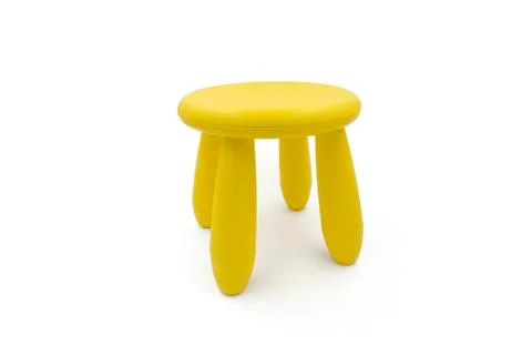 Cute stool isolated on white background. Kids chair. Yellow stool. Stock Photos