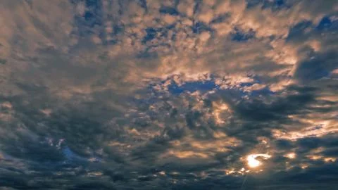 Cute sundown gold clouds on the sky backdrop - photo of nature Stock Photos