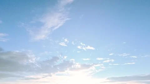 Cute sunset gold clouds on the sky background - photo of nature Stock Photos