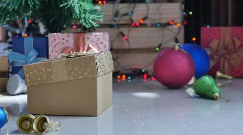 Cute tabby kitten playing in a gift box with Christmas decoration Stock Footage 68899898