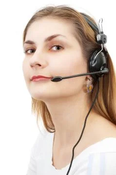 Cute techsupport girl on the phone using headset Foto stock