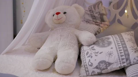 Cute teddy bear on the bed. Stock Footage 103325815