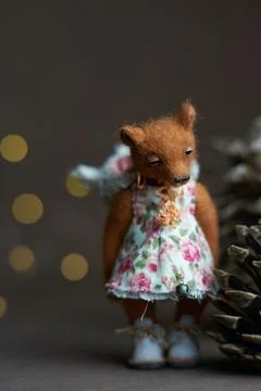 Cute teddy bear isolated on light background. Holiday glowing backdrop. Def.. Stock Photos