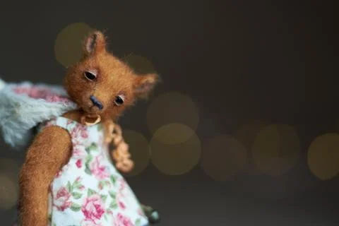 Cute teddy bear isolated on light background. Holiday glowing backdrop. Def.. Foto stock