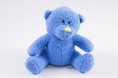 Cute teddy bear on a white background. Stock Photos
