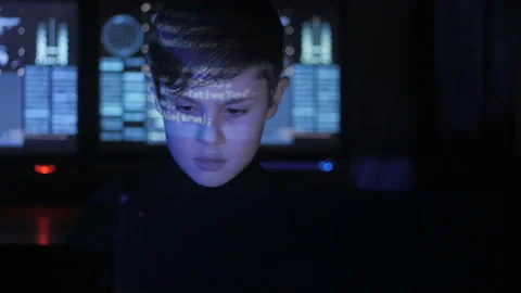 Cute teen Boy hacker programmer is working on computer in cyber security center Vidéo 86438931