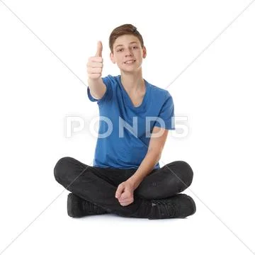 Cute teenager boy over white isolated background Stock Photos