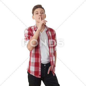 Cute teenager boy over white isolated background Stock Photos