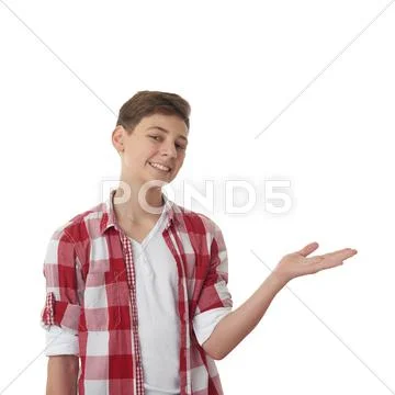 Cute teenager boy over white isolated background Stock Photos