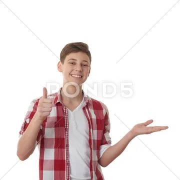 Cute teenager boy over white isolated background Stock Photos