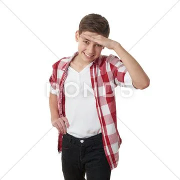 Cute teenager boy over white isolated background Stock Photos