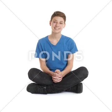 Cute teenager boy over white isolated background Stock Photos