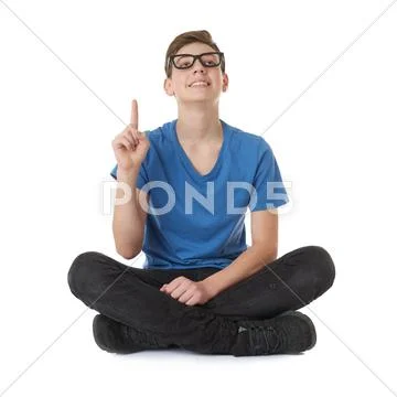 Cute teenager boy over white isolated background Stock Photos