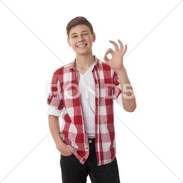 Cute teenager boy over white isolated background Stock Photos