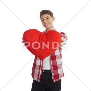 Cute teenager boy over white isolated background Stock Photos