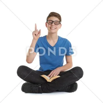 Cute teenager boy over white isolated background Stock Photos