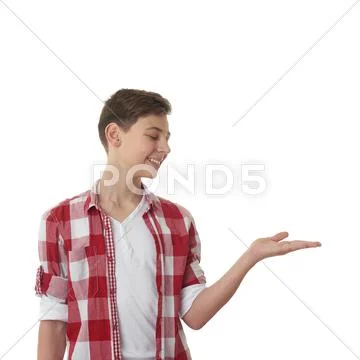 Cute teenager boy over white isolated background Stock Photos