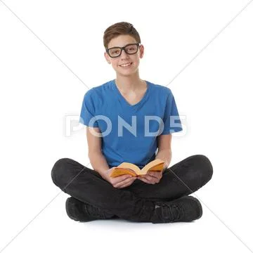 Cute teenager boy over white isolated background Stock Photos