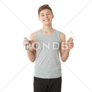 Cute teenager boy over white isolated background Stock Photos