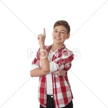 Cute teenager boy over white isolated background Stock Photos
