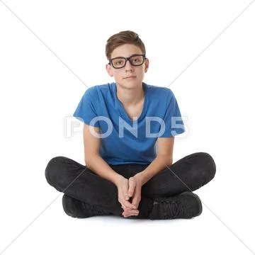 Cute teenager boy over white isolated background Stock Photos