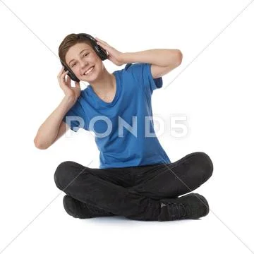 Cute teenager boy over white isolated background Stock Photos
