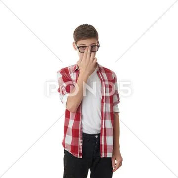 Cute teenager boy over white isolated background Stock Photos