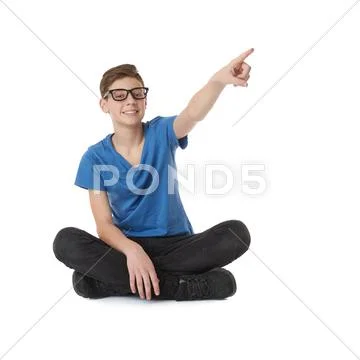 Cute teenager boy over white isolated background Stock Photos