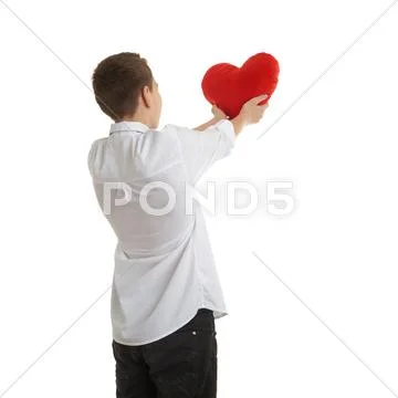 Cute teenager boy over white isolated background Stock Photos