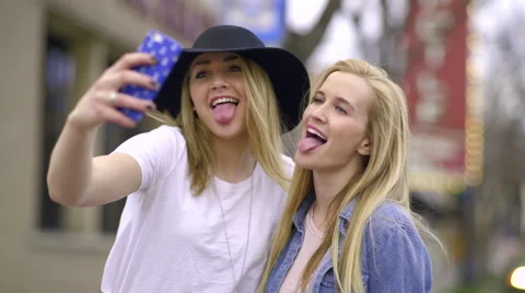 Cute Teens Take Fun Selfies Together On City Adventure Stock-Footage 62531292